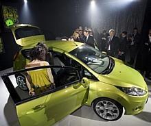 John Fleming President and CEO Ford of Europe revealing the new Ford Fiesta at Geneva Motor Show 2008. 